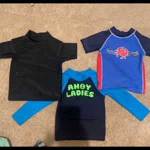 3 swim tops. Size 18-24 months.